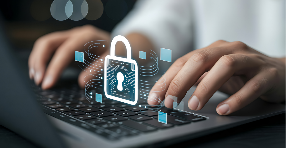 Person using laptop with cybersecurity lock icon overlay